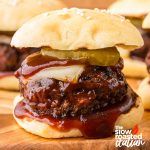 closeup of bbq sliders smothered in sauce