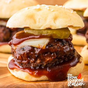 closeup of bbq sliders smothered in sauce