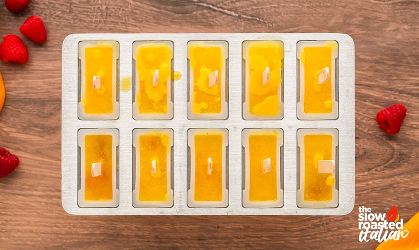 frozen orange juice popsicles in mold