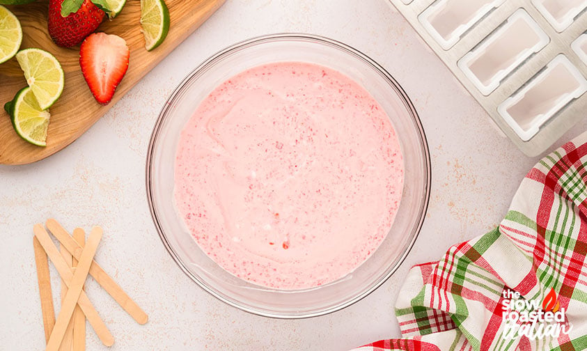 mixed strawberry yogurt mixture in a bowl