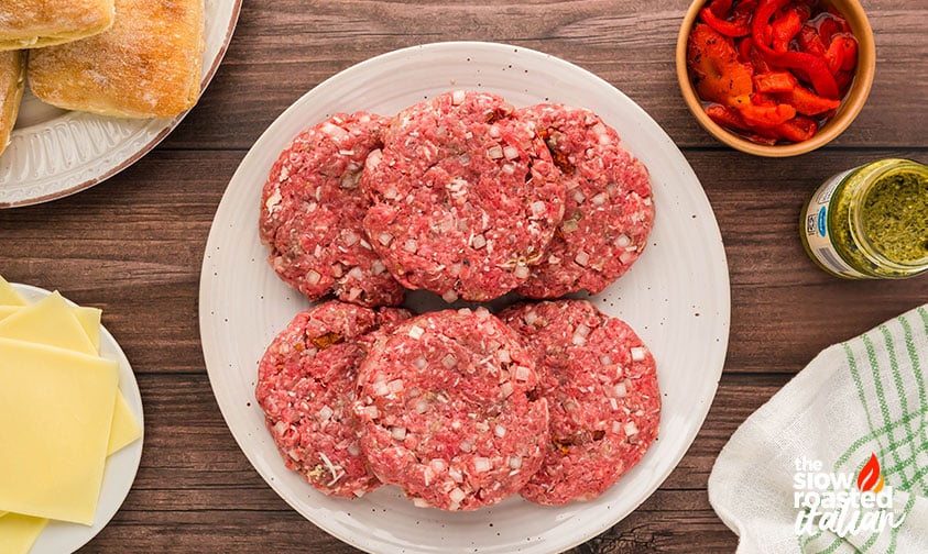 Tuscan Inspired Mediterranean Burger patties on a white plate