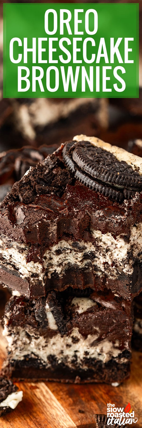 Stacked Oreo cheesecake brownies showing the fudgy chocolate layers, creamy cheesecake swirl, and whole Oreo cookie on top