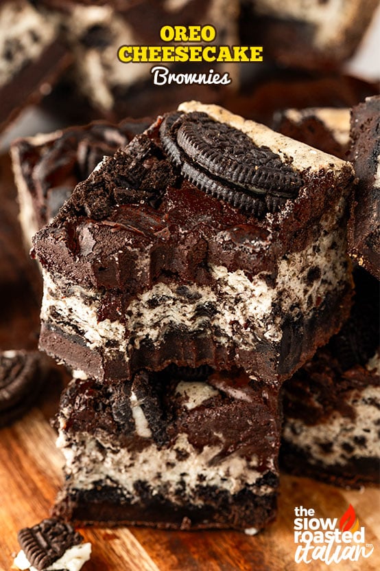 Oreo cheesecake brownies cut into squares, showing the swirled cheesecake top and fudgy brownie base