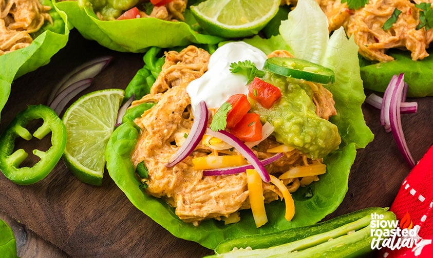 Crockpot Mexican chicken with cream cheese piled into lettuce cups