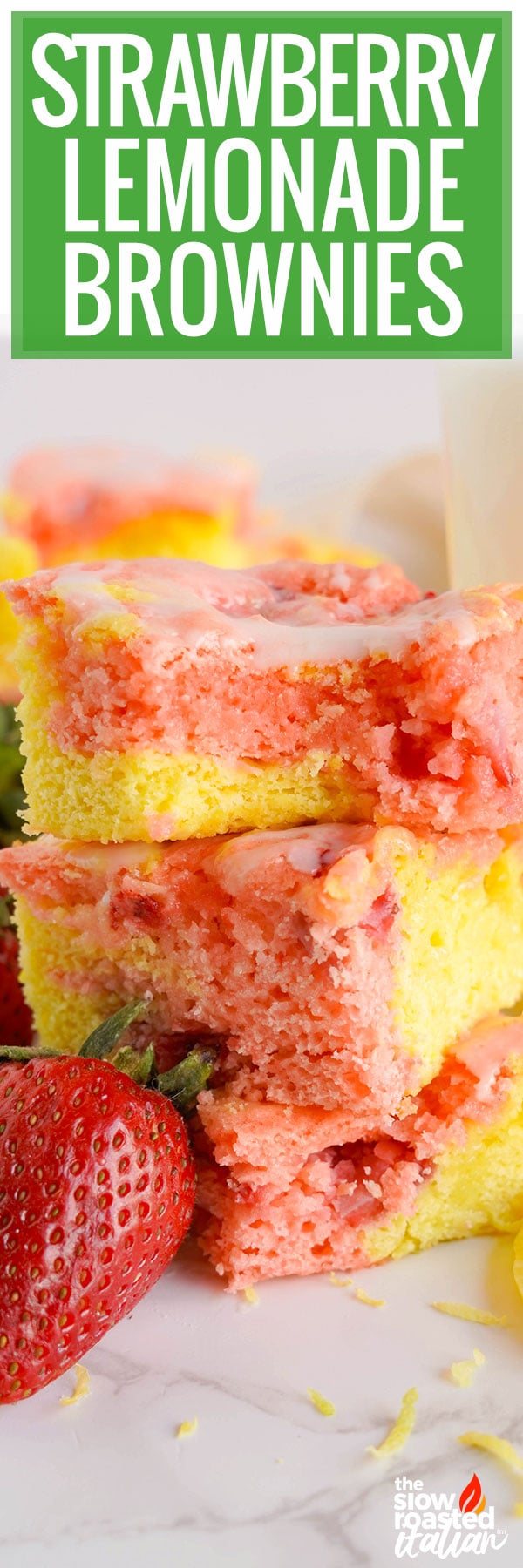 Close-up of stacked strawberry brownies with pink swirl and lemon glaze
