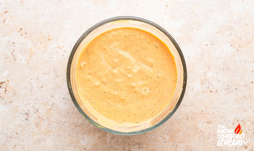 Creamy special sauce mixed in a glass bowl for Big Mac sloppy joes