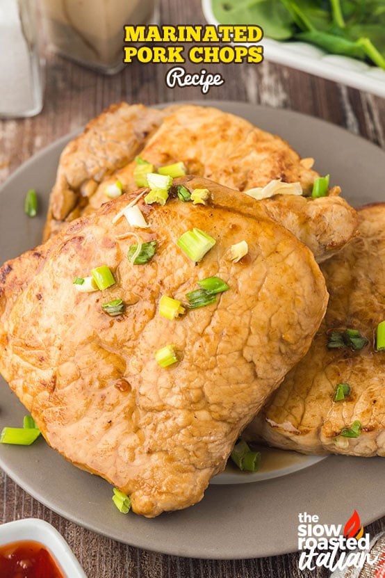 marinated pork chops with a glossy root beer glaze in a baking dish