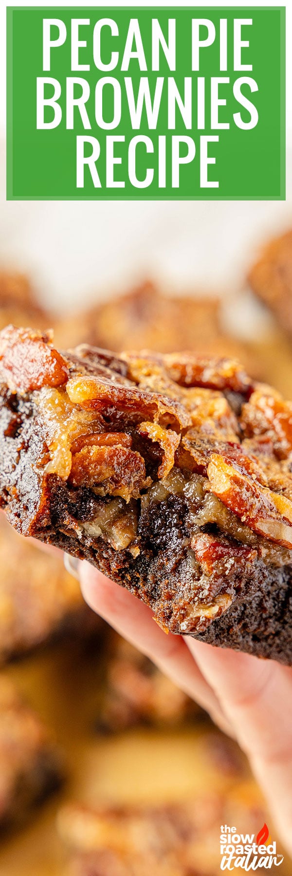 Pecan Pie Brownies Recipe - hand holding a fudgy brownie topped with gooey pecans