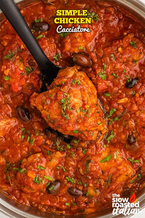 chicken cacciatore with bone-in chicken in a tomato, pepper and mushroom sauce in a Dutch oven