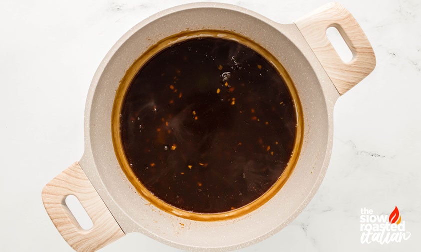 Teriyaki sauce simmering in a pot for teriyaki chicken casserole
