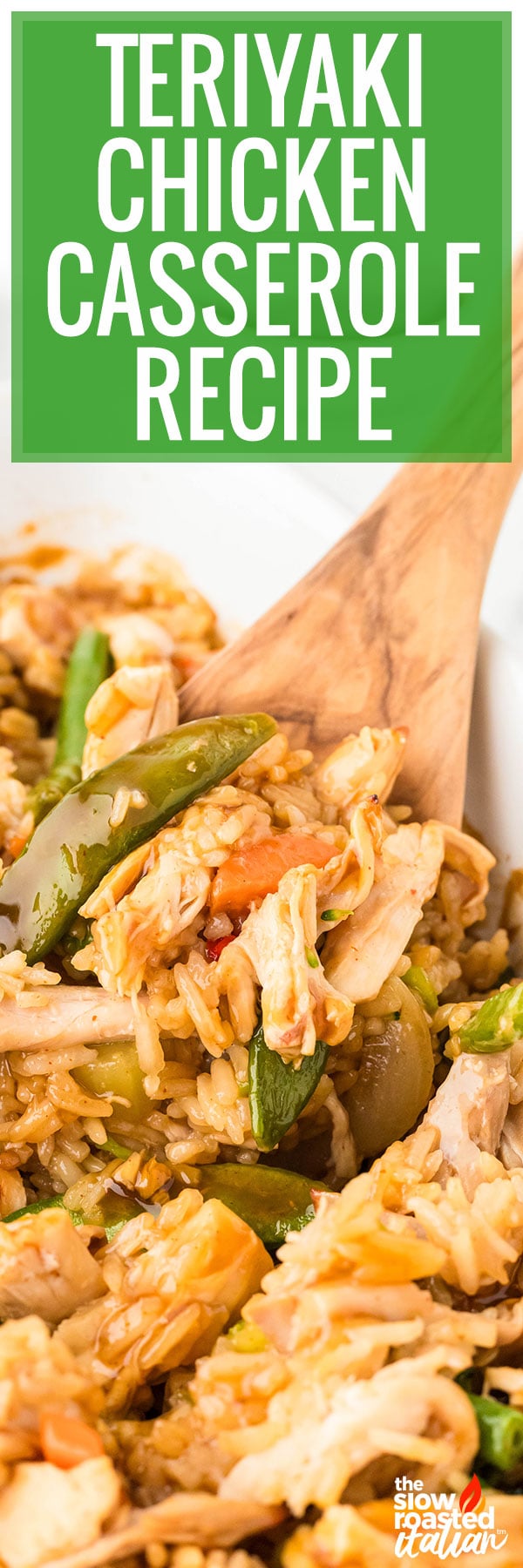 Close-up of teriyaki chicken casserole with rice, snap peas, and carrots scooped with a wooden spoon
